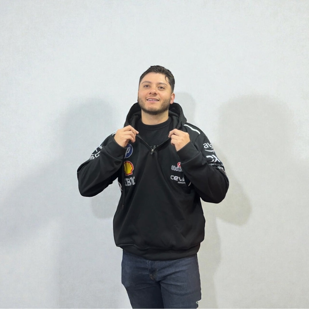 Buzo Ferrari Negro – Estilo Oficial Motorsport | Pasión y Elegancia Italiana