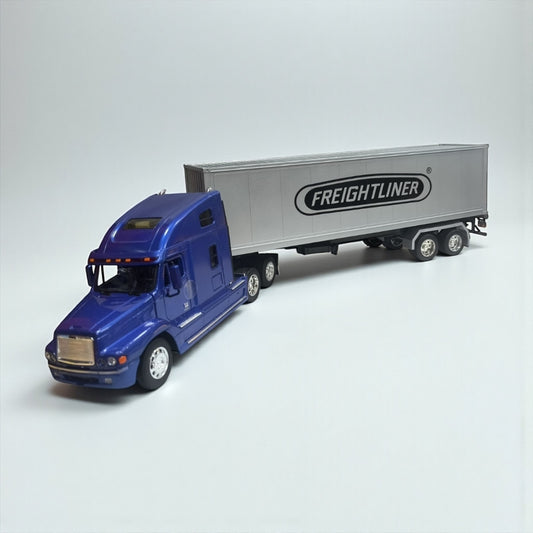 Freightliner Columbia 1:32 con Tráiler Azul – Camión de Carga Imponente en Edición Coleccionable