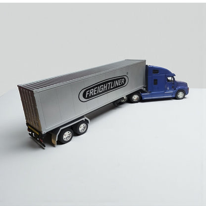 Freightliner Columbia 1:32 con Tráiler Azul – Camión de Carga Imponente en Edición Coleccionable