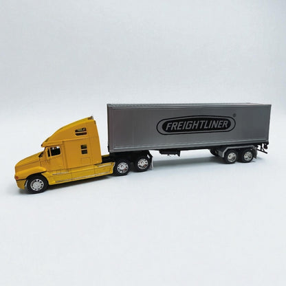 Freightliner Columbia 1:32 con Contenedor – Modelo de Colección en Metal (Amarillo)