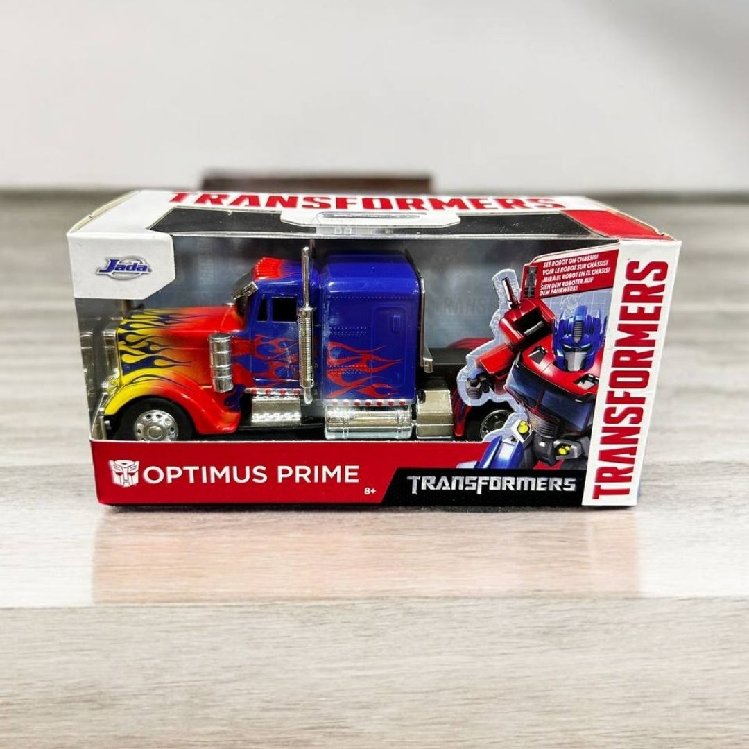 Optimus Prime 1:32 Transformers - Figura a Escala Coleccionable